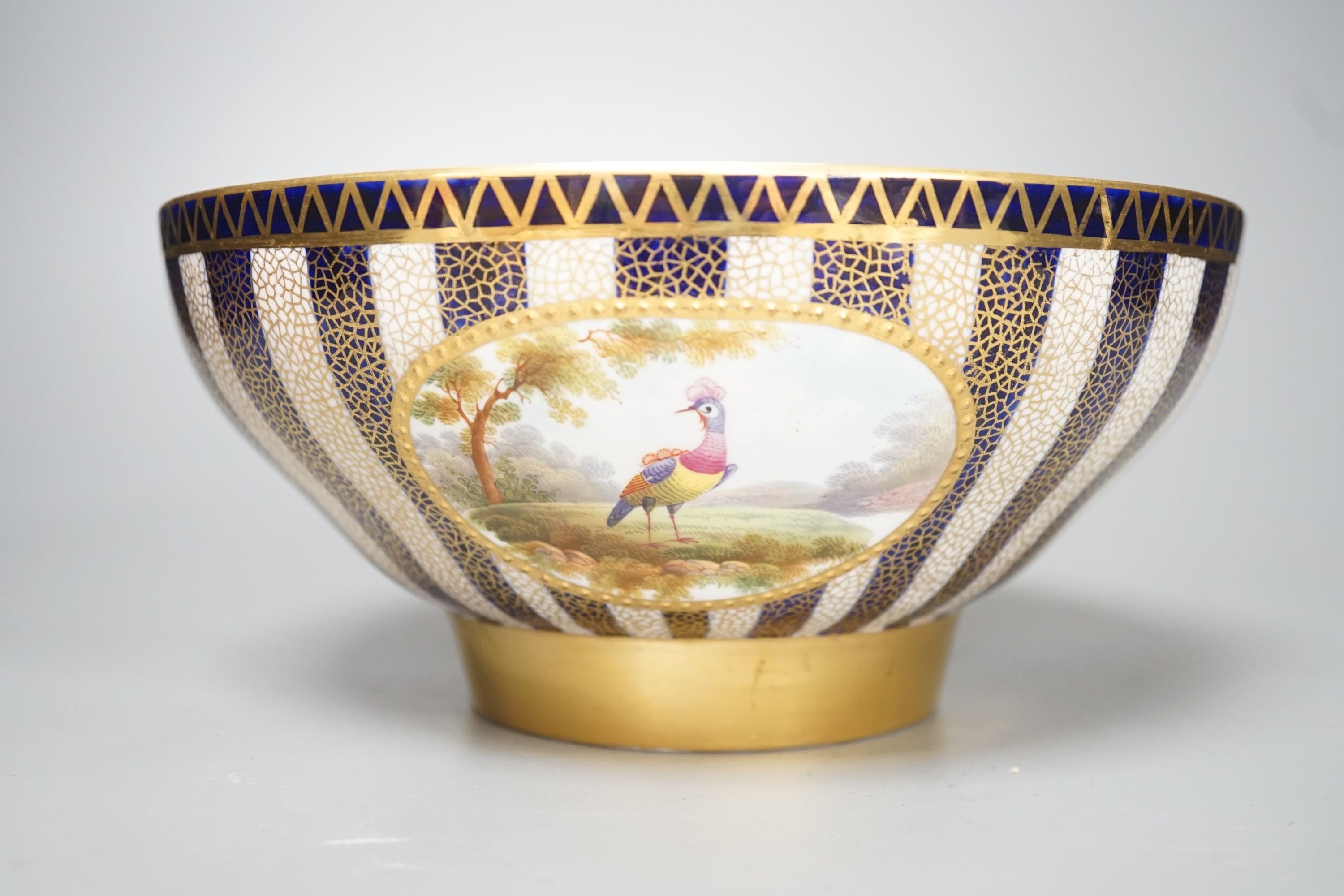 An Aynsley fine bowl with three interior landscape panels and three exterior panels painted with birds between alternating blue and white gilt stripes four panels signed R.J.K. for Richard J. Keeling, c.1910, height 10.5